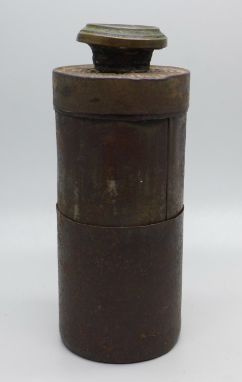 A trench art type telescope made from a Borwick's baking powder tin, glass/lens cracked 