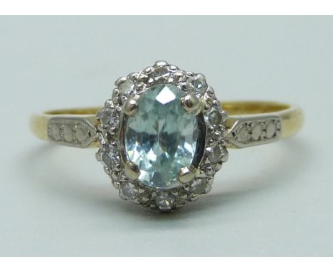 A vintage 18ct gold, platinum set aquamarine and diamond cluster ring, 3g, R 