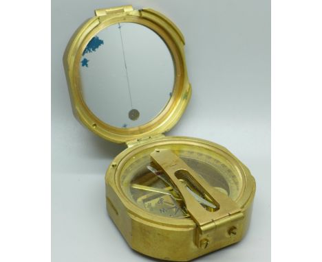 A brass Natural Sine compass 