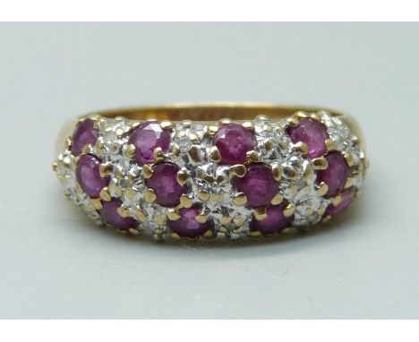 A 9ct gold, diamond and ruby ring, 3.3g, N 