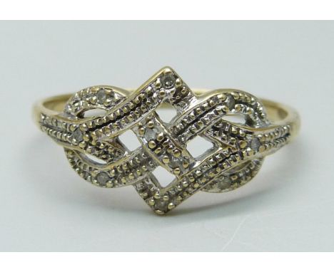 A 9ct gold, diamond set Celtic knot ring, 2.2g, V 