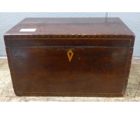 A 19th Century inlaid mahogany tea caddy, 31cm wide, some a/f 