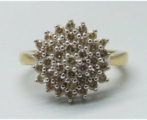 A 9ct gold and diamond cluster ring, 4.2g, O 