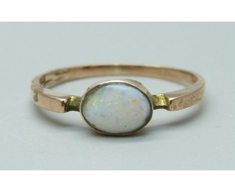 A 9ct gold and opal solitaire ring, 1.3g, L, stone worn 