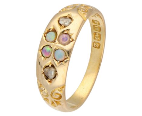 Antique 18K Yellow gold English ring with opal and diamond. With four cabochon cut opals and two rose cut diamonds set in a f