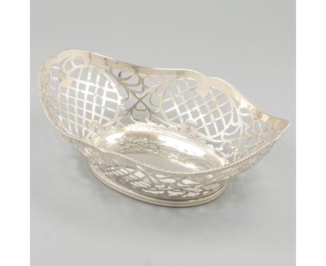 Silver bonbon basket. Oval model with soldered pearl edge, partly openwork sides and fillet edge. The Netherlands, Schoonhove