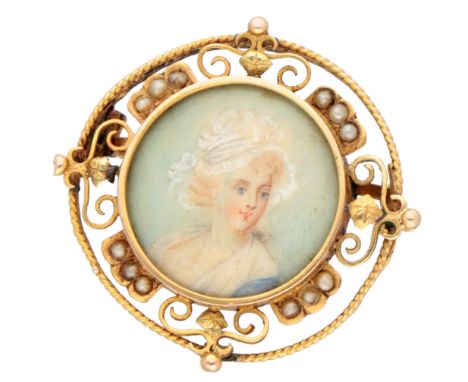French 18K yellow gold antique brooch of a portrait painted on mother-of-pearl surrounded by seed pearls. In the style of the