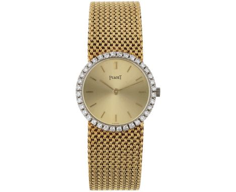 Piaget Diamond Bezel Dress Watch 926D21 - Ladies watch. Case: yellow and white gold (18 kt.) - bracelet: yellow gold (18 kt.)