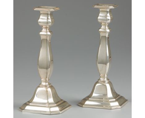 2-piece set of candlesticks, silver. Beautiful stylized set. Belgium, first half 20th century, hallmarks: A830, unknown maker