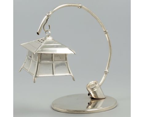 Salt shaker silver. Beautiful salt shaker in the shape of a lantern hanging on a curved bamboo stick. Japan, 20th century, ha