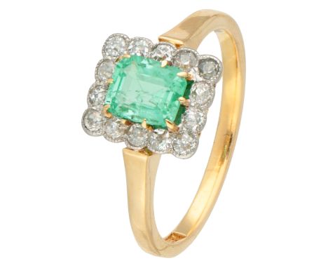 14K Yellow gold entourage ring set with green stone and diamonds. Set with a step cut emerald (5.85 x 5.08 3.11 mm) and 14 ol