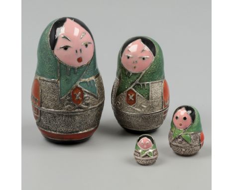 Matryoshka doll (4 pieces), silver. A silver Matryoshka / stacking doll, consisting of four decreasing sizes nested into each