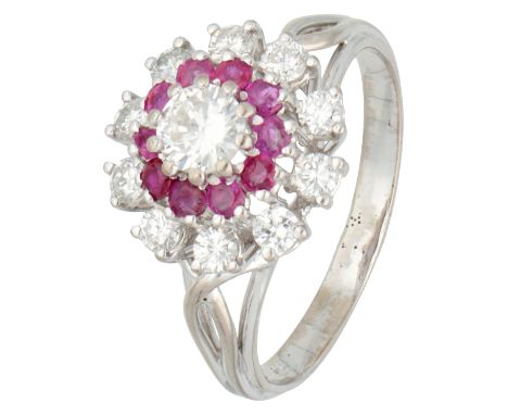 18K White gold entourage ring set with approx. 1.53 ct. diamond and ruby. Set with eleven brilliant cut diamonds of approx. 0