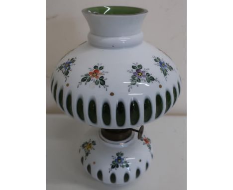 Late Victorian oil lamp with painted and white overlaid glass reservoir and shade (24cm) 