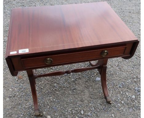 Small drop-leaf mahogany sofa type table with single drawer and turned cross stretcher (41cm x 92cm x 56cm) 