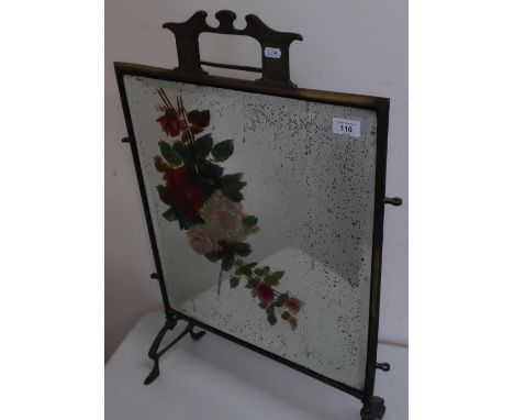 Early 20th C brass framed firescreen with inset bevel edged mirror panel with hand painted decoration 
