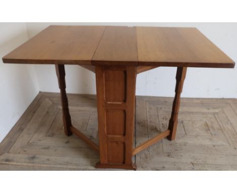 Yorkshire oak craftsman Mouseman style gate leg table, with two fall leaves and panel carved ends (75cm x 110cm, x 76cm) (car