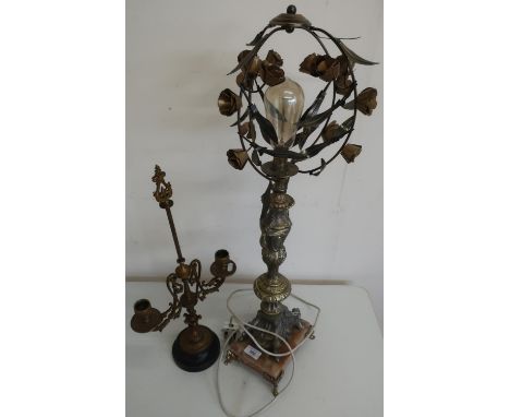 Elaborate gilt metal table lamp on rectangular marble base and a two branch gilt metal candle stick on turned marble base (2)