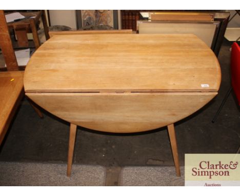 An Ercol drop leaf kitchen table, 103cm 