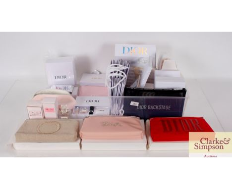 A collection of Christian Dior items, including 4 miniature perfumes (5ml), miniature set boxes, 2 empty Miss Dior perfume bo