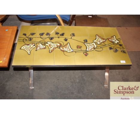A Retro tile and chrome coffee table, 91cm x 46cm