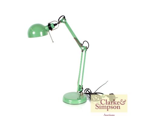 A green angle poise type lamp