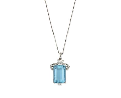 An aquamarine and diamond brooch/pendant, circa 1950The step-cut aquamarine within a scrolling openwork setting, accented by 