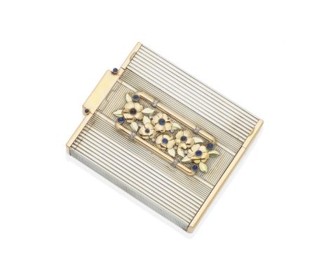 A gem-set silver and gold vanity case, by Ostertag, circa 1930The reeded case set to the front with a bicoloured gold floral 