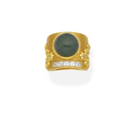 A jade and diamond ringThe matte wide tapering band set with a circular jade cabochon, below a row of octagonal step-cut diam