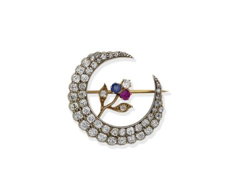 A gem-set crescent brooch,The crescent moon set throughout with old brilliant, rose-cut and cushion-shaped diamonds, issuing 