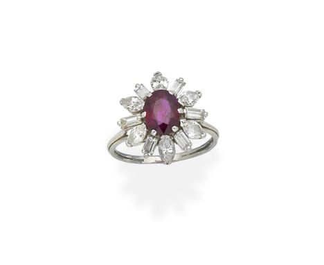 A ruby and diamond cluster ringThe oval-cut ruby within a surround of baguette and marquise-cut diamonds,  diamonds approx. 2