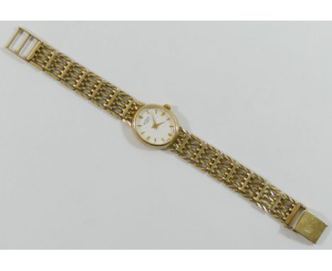 A ladies 9 carat gold Rotary bracelet watch, Birmingham 1995, the oval face with baton numerals, fitted with gate link bracel