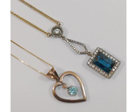 A rose coloured open heart-shaped pendant, set with a blue zircon drop, 3cm long, on fine yellow metal box link chain, stampe