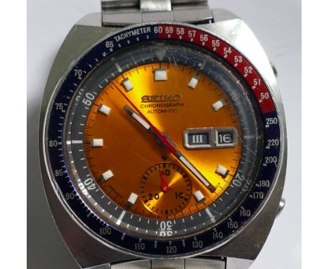 A gentleman's Seiko 'Aussie Pogue' Automatic Chronograph wrist watch, with yellow dial, day and date aperture and subsidiary 
