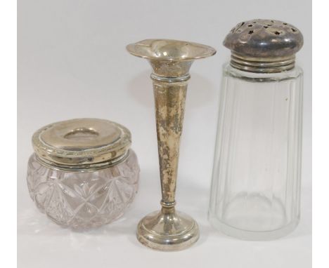 A collection of assorted silver items comprised of a small trumpet-shaped vase and an inkwell (each with weighted bases), a s