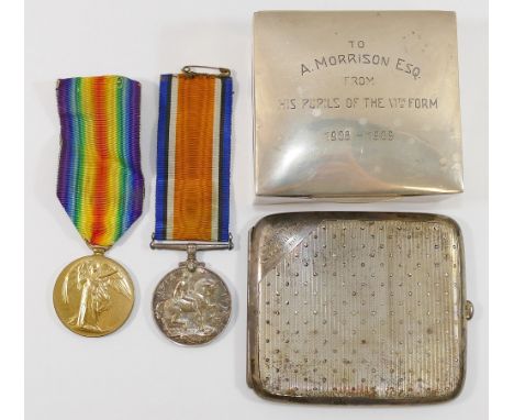 A WWI medal group awarded to Reverend A Morrison comprised of a British War Medal and the Victory medal, and a silver cigaret