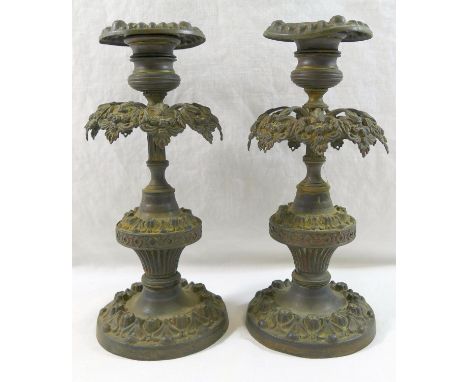 An ornate brass three light candleabra, cast with a cherub and converted to electricity, 38cm high, a pair of 19th century br