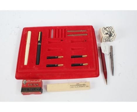 Osmiroid part pen set, silver plated propelling pencil, a Miniman propelling pencil, Winsor &amp; Newton ink bottle and a box