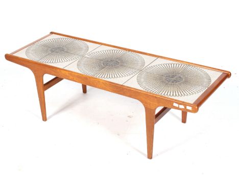 A mid-century teak and ceramic tile top rectangular coffee table. On tapering rectangular supports. L128cm x D44cm x H41cm