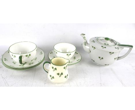 A vintage Shelley 'Late Foley' clover pattern one piece tea service. Comprising a teapot, a cup and saucer, a plate, jug and 