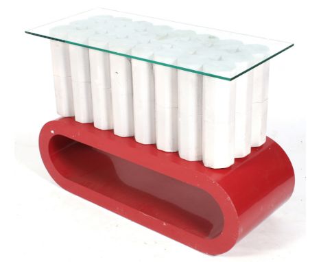 A Sarah Swords-King designed contemporary coffee table. Consisting of a red base, grey honey comb centre and glass top. L102c