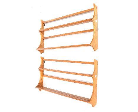 A pair of Ercol mid-century golden dawn plate racks. Solid elm wall mounted grooved plate rack shelf. L97cm x D13cm x H49cm