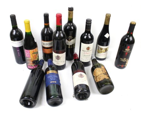 Twelve bottles of red wine. Including Castillo de Landa Cabernet Sauvignon, Lomas de Castillo Tinto, etc.