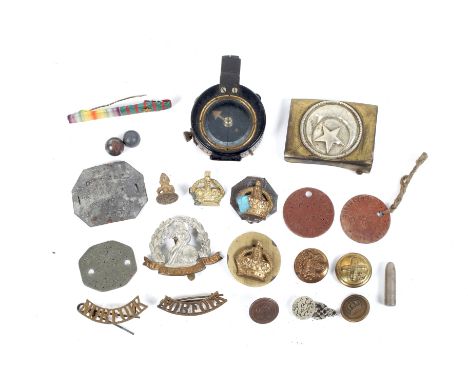 Assorted militaria interest items, many relating to NORFOLK. Including a brass bound military compass, badges, various cap ba