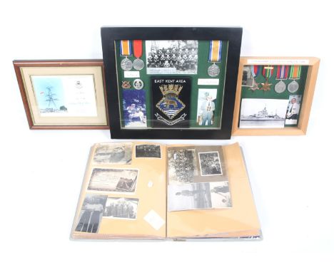 Two sets of WWI and WWII military medals and a quantity of associated printed ephemera and photographs, etc. Framed WWI medal