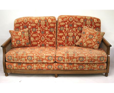 A beregere style two piece suite. Comprising a three seater sofa and armchair, the sofa, H84cm x W190cm x D81cm