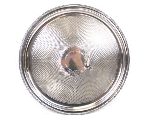 A vintage Gladwin Ltd Embassy engine turned circular tray. Stamped 'M.C.C.'. Diameter 30cm
