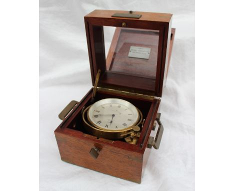 A Hamilton marine Chronometer with quartz movement No.0099, the 7.5cm silvered dial with Roman numerals, contained with a thr