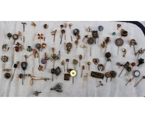 A collection of stick pins together with assorted costume jewellery including bracelets, wristwatches, beadwork necklaces, br