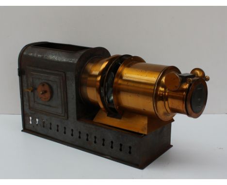 An Andrew H Baird tin plate and lacquered brass magic lantern, contained in a tin box